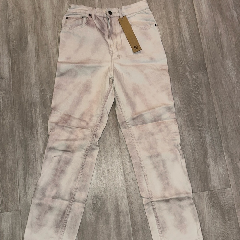 KSUBI White and pink dye denim jeans
